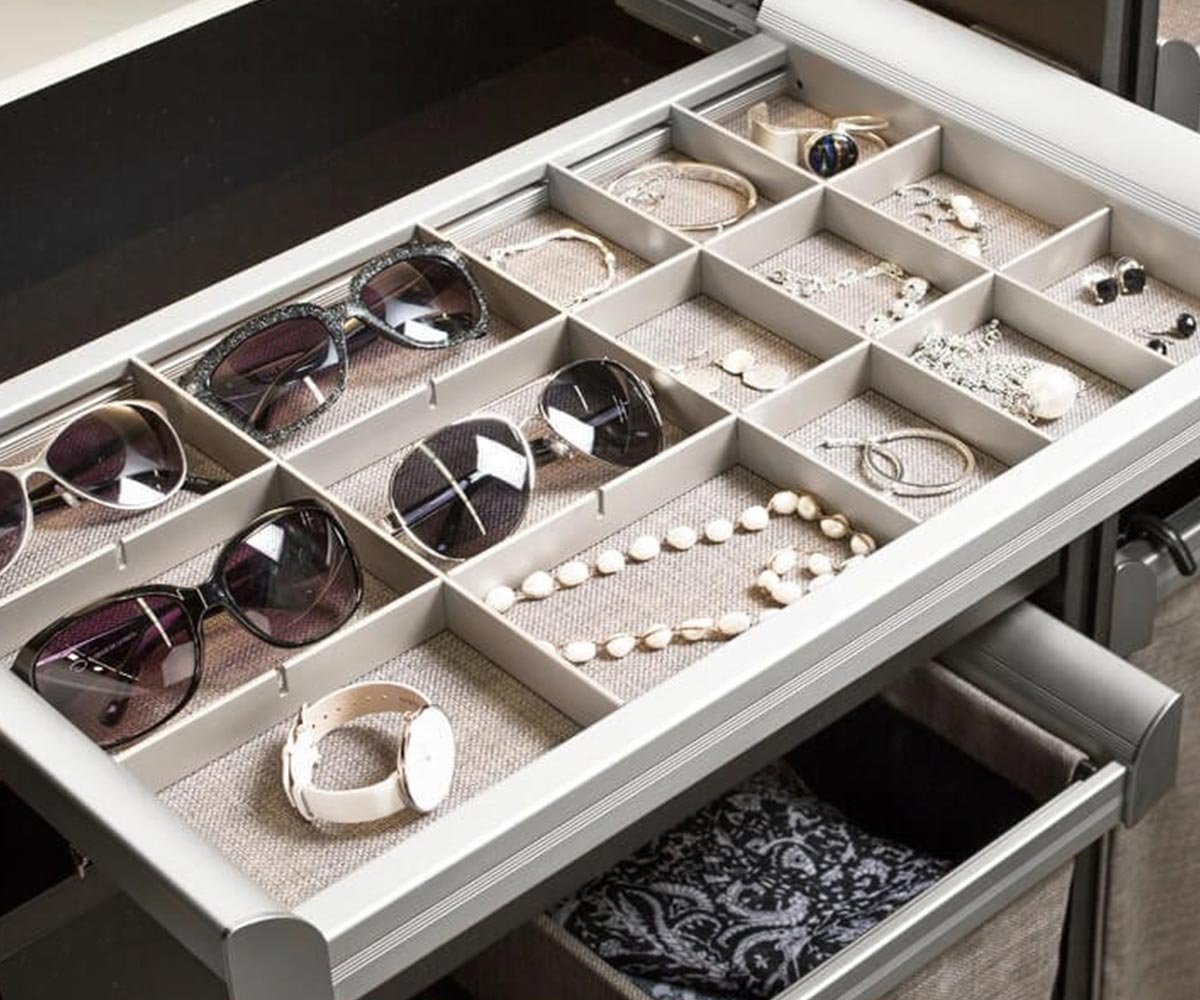 Custom closet accessories with jewelry drawers, pull-out racks and shoe storage