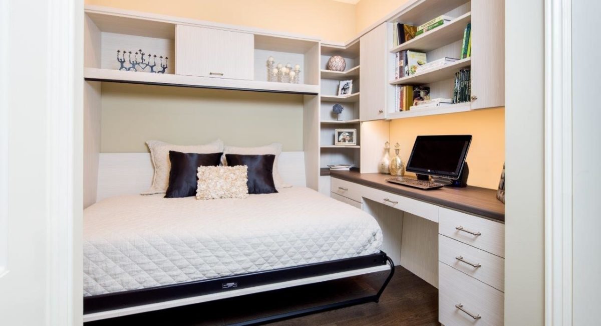 Custom wall bed interior with storage around the mattress