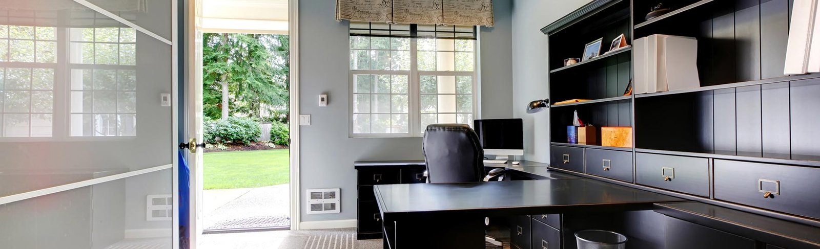 Custom home office with shelving and worksurface