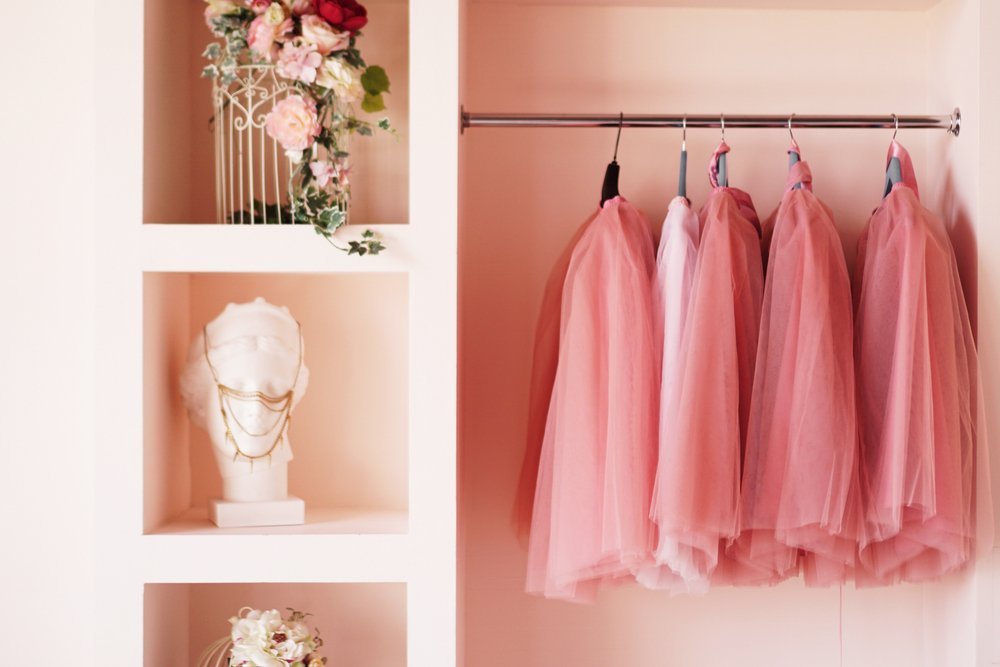 Custom kids closet with cubbies and double hanging