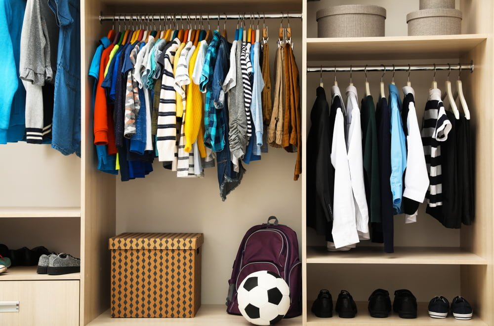 Nursery closet with shelves for folded baby clothes