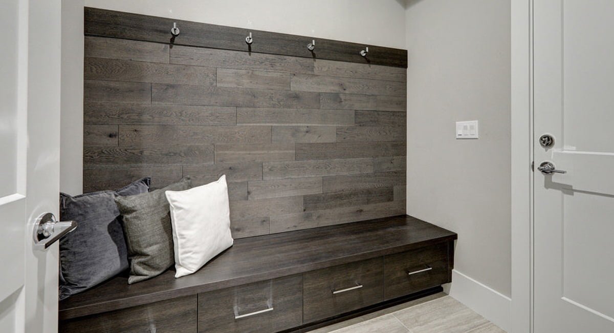 Mudroom entry with lockers and a drop zone