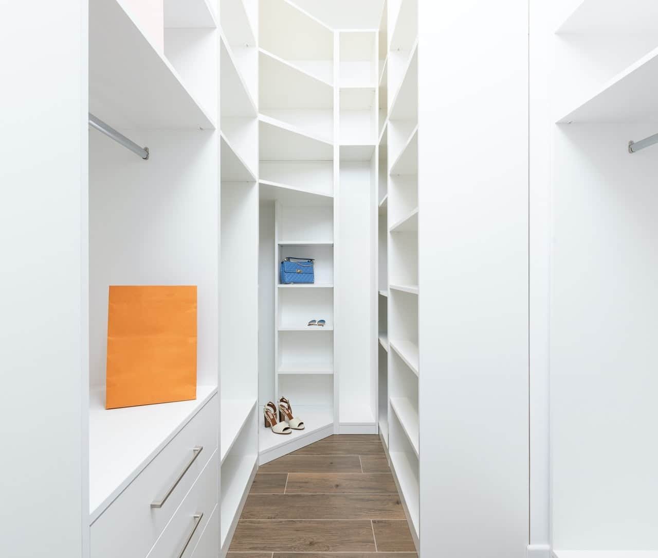 Walk-in closet storage with shelves and hanging